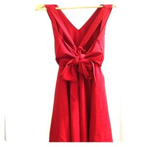 Artisan made red tie-back mini dress.